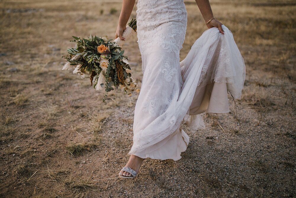 bride with flower bouquet, alpine glow on mt princeton, the barn at sunset ranch in buena vista co, buena vista colorado wedding, the barn at sunset ranch wedding, buena vista colorado wedding venue