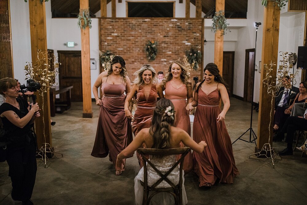 bridesmaids song and dance routine to the bride, the barn at sunset ranch in buena vista co, buena vista colorado wedding, the barn at sunset ranch wedding, buena vista colorado barn wedding venue