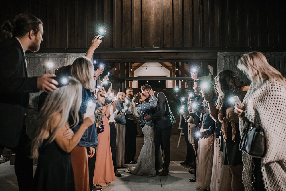 faux sparkler phone light wedding send off, the barn at sunset ranch in buena vista co, buena vista colorado wedding, the barn at sunset ranch wedding, buena vista colorado barn wedding venue