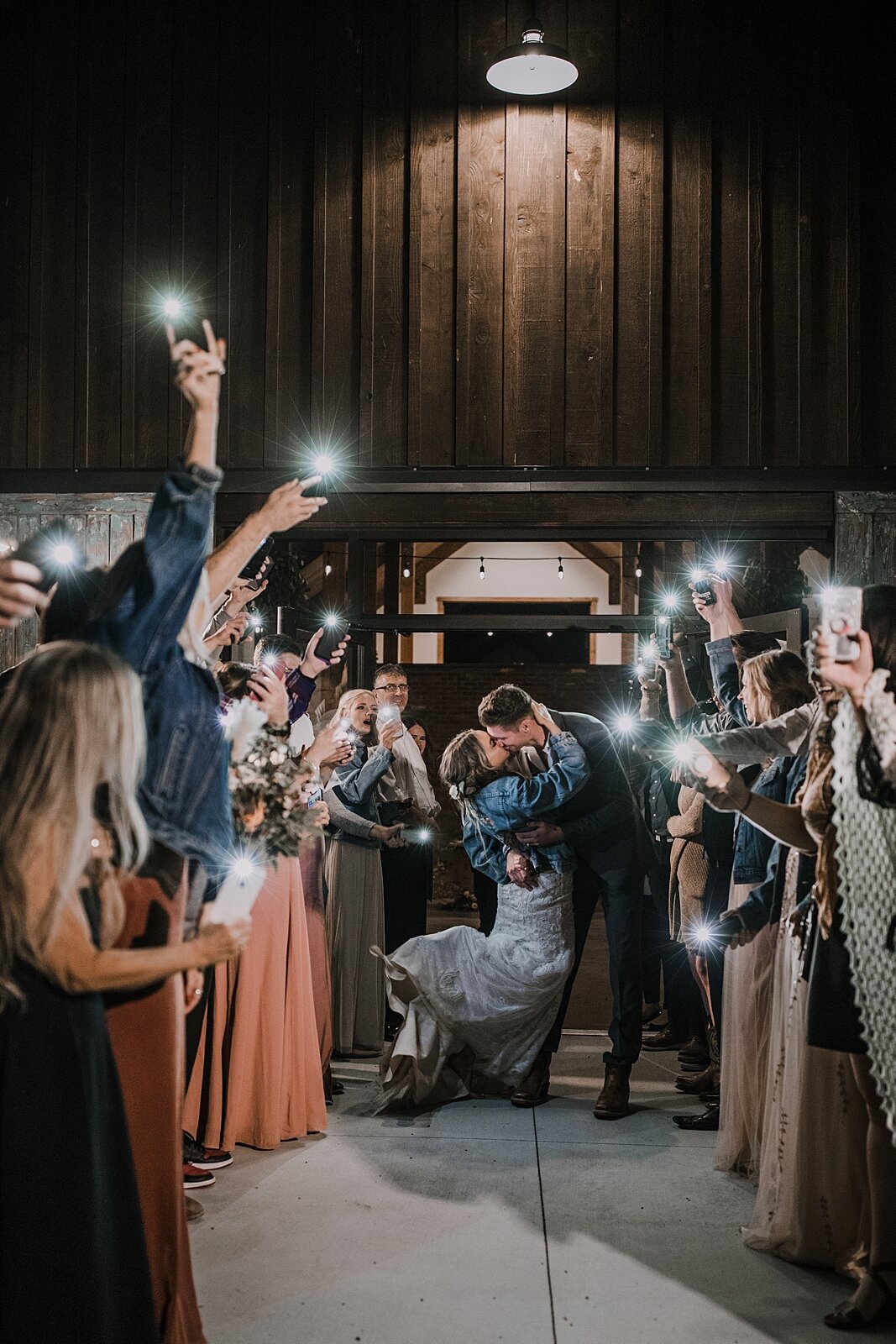 faux sparkler phone light wedding send off, the barn at sunset ranch in buena vista co, buena vista colorado wedding, the barn at sunset ranch wedding, buena vista colorado barn wedding venue