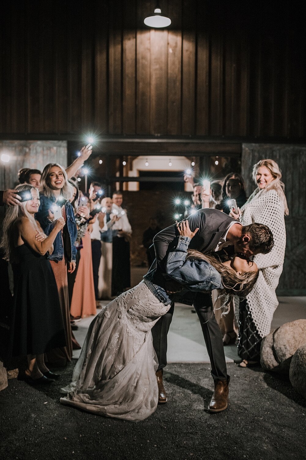 faux sparkler phone light bride and groom send off, the barn at sunset ranch in buena vista co, buena vista colorado wedding, the barn at sunset ranch wedding, buena vista colorado barn wedding venue