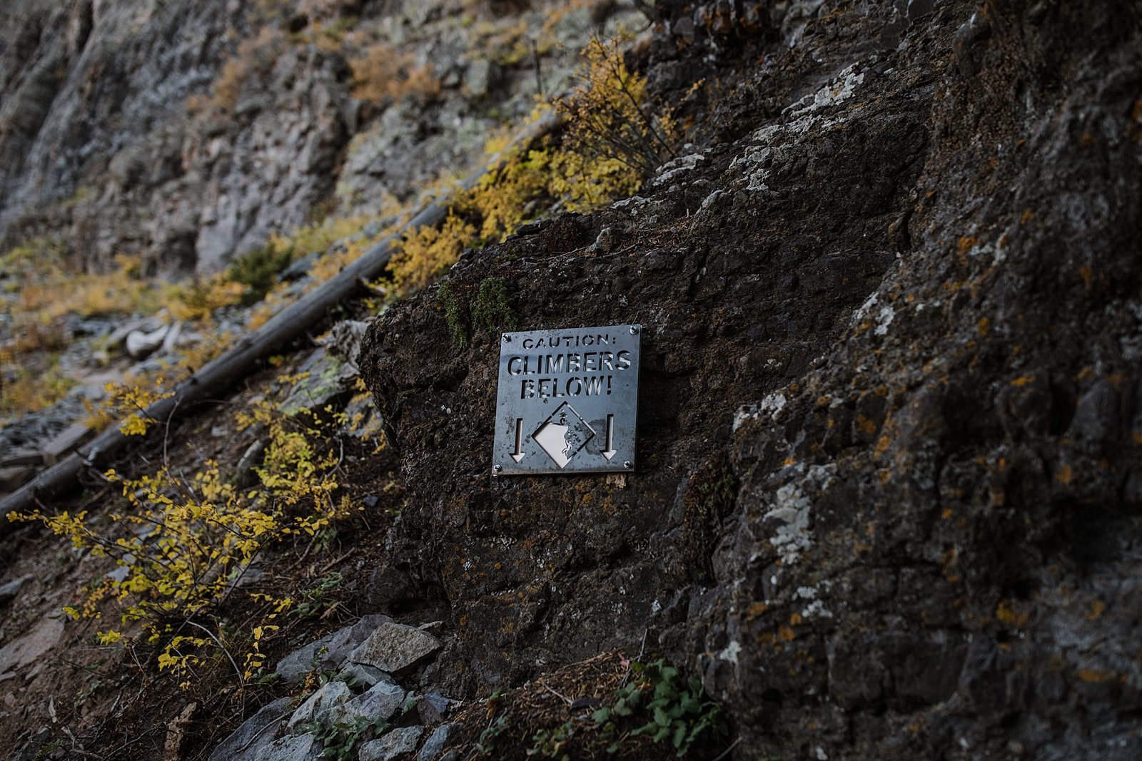 climbers below sign on the via ferrata trail, climbing the via ferrata in telluride colorada, san juan via ferrata, colorado via ferrata