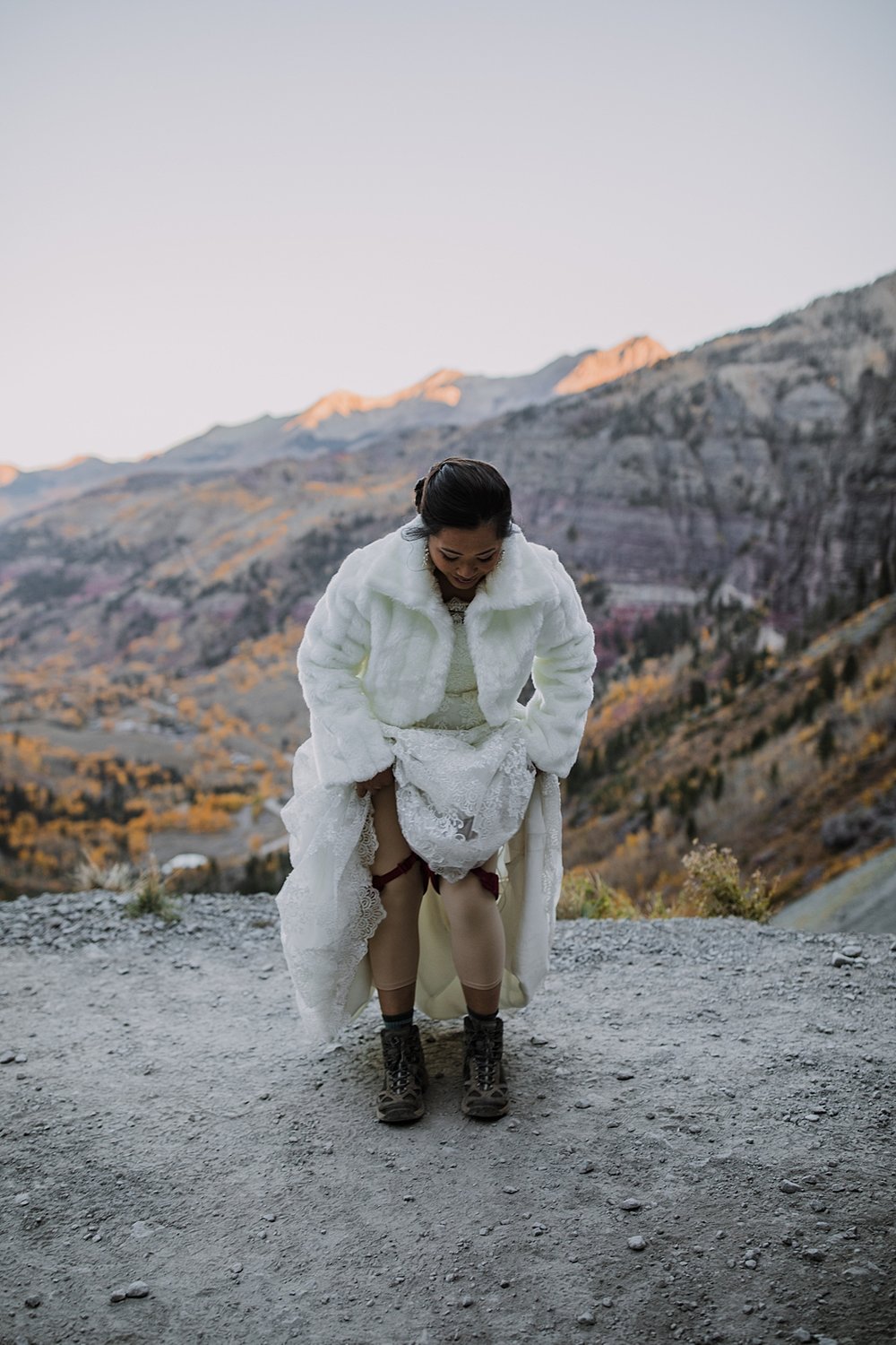 bride in climbing harness, rocky mountain range elopement, rocky mountain climbing elopement, san juan climbing, pipeline climbing elopement