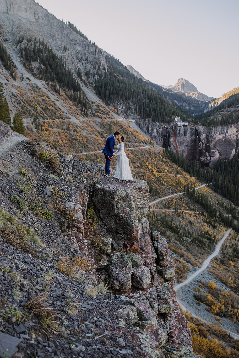 bride and groom in mountainscape, cliffside elopement, mountain climbing elopement, colorado climbing elopement, southern colorado elopement, telluride elopement