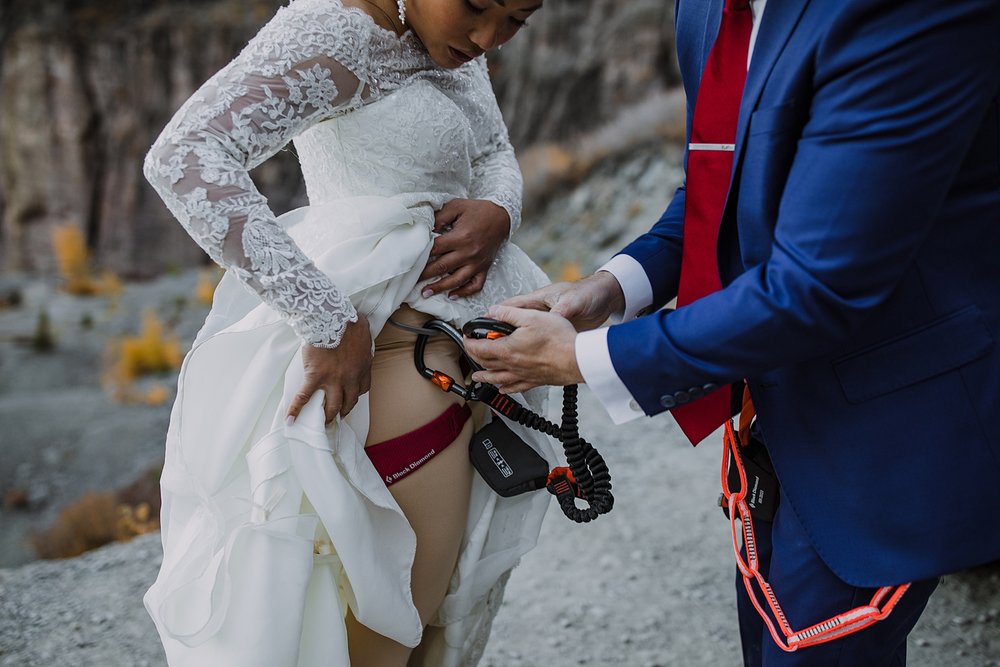 bride and groom climbing, telluride via ferrata climbing elopement, via ferrata climbing elopement, rock climbing wedding, elopement day ideas