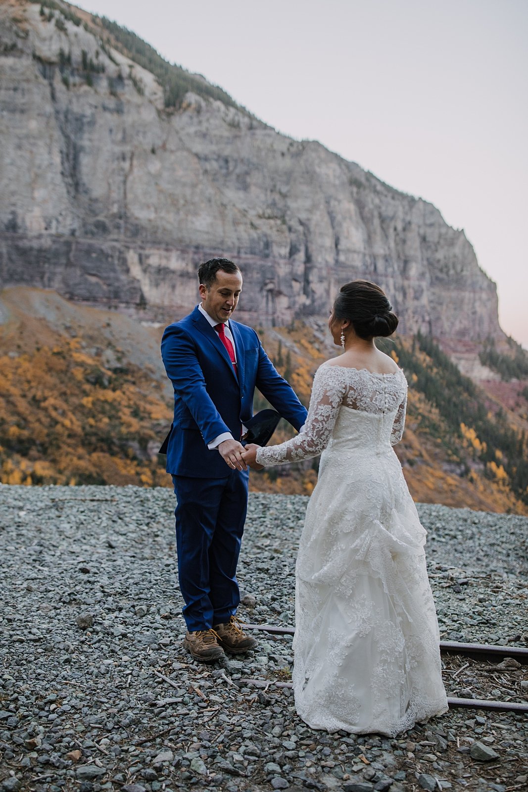 groom sees bride for the first time, telluride climbing elopement, southern colorado elopement, san juans climbing elopement, san juans via ferrata, black bear pass mines