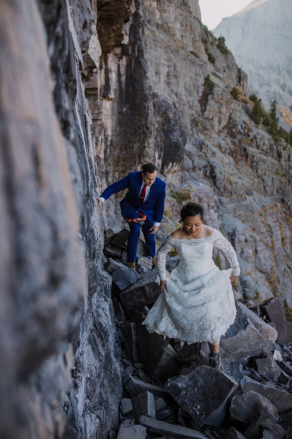 couple scrambling on via ferrata, southern colorado fall elopement, san juan mountains fall elopement, telluride climbing elopement, southern colorado elopement, san juan range climbing elopement