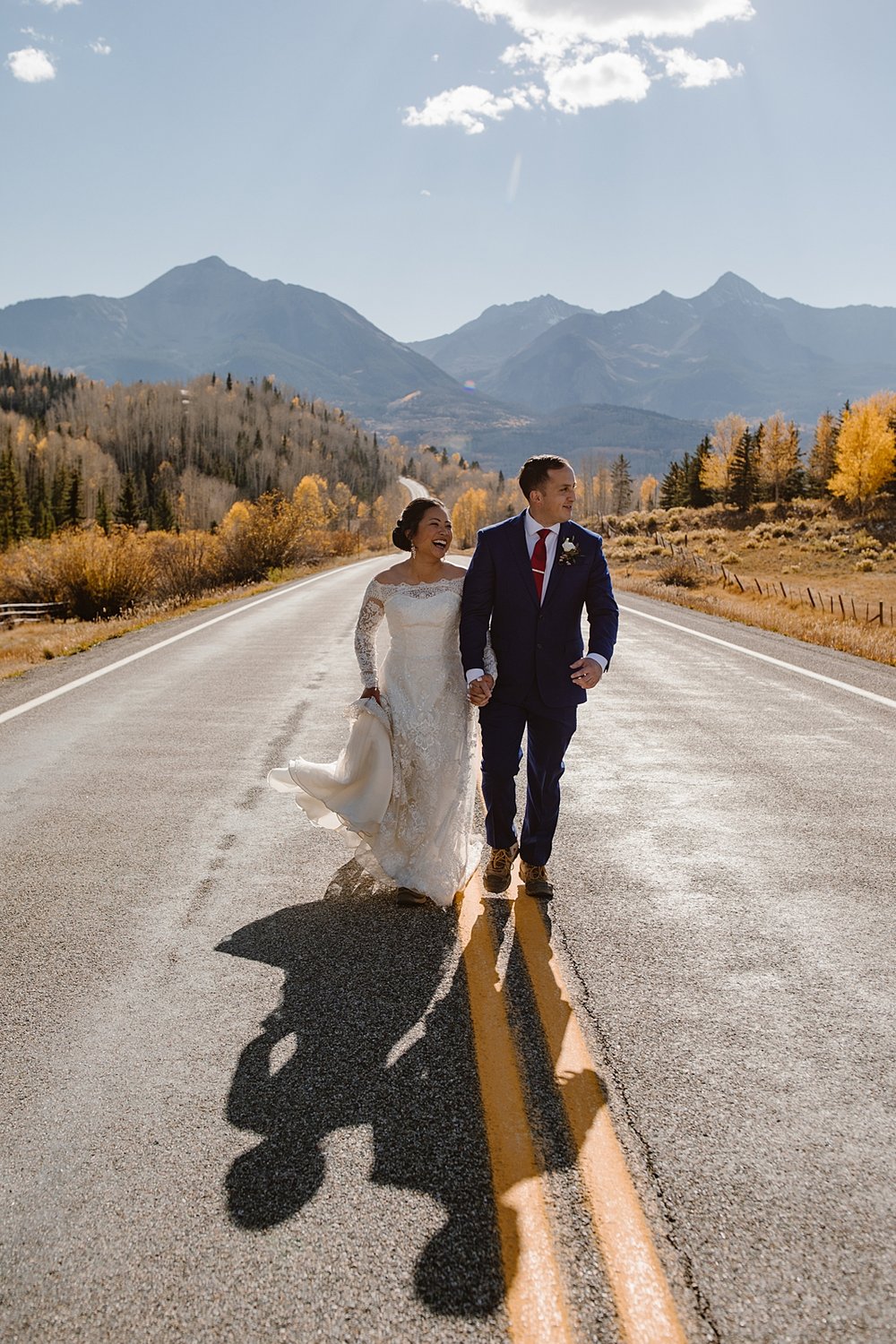 bride and groom walking, alta lakes elopement, alta lake ghost town elopement, ames colorado elopement, ames colorado mountain elopement, ames colorado waterfall elopement, ophir colorado elopement