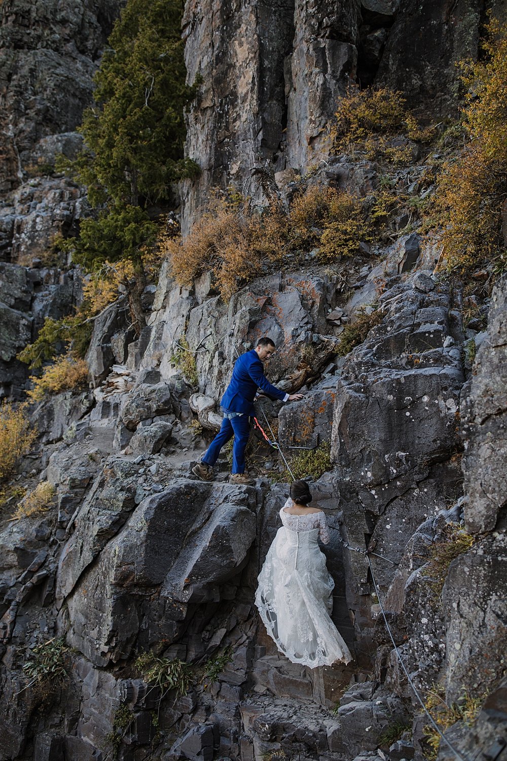 couple hiking together, bridal veil falls hike, telluride via ferrata wedding, telluride via ferrata elopement, san juan mountain wedding, hiking black bear pass, via ferrata climbing gear