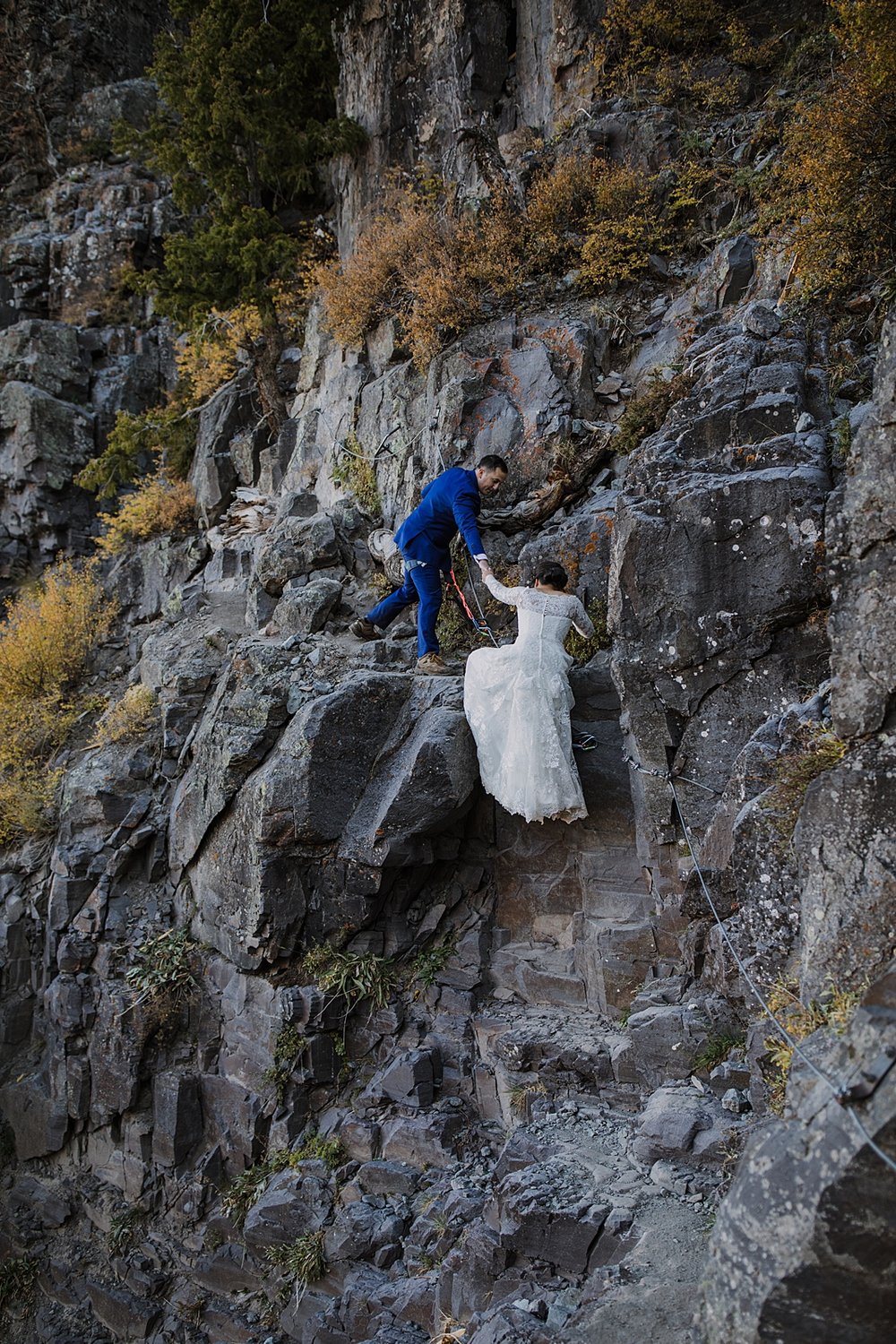 couple hiking together, bridal veil falls hike, telluride via ferrata wedding, telluride via ferrata elopement, san juan mountain wedding, hiking black bear pass, via ferrata climbing gear