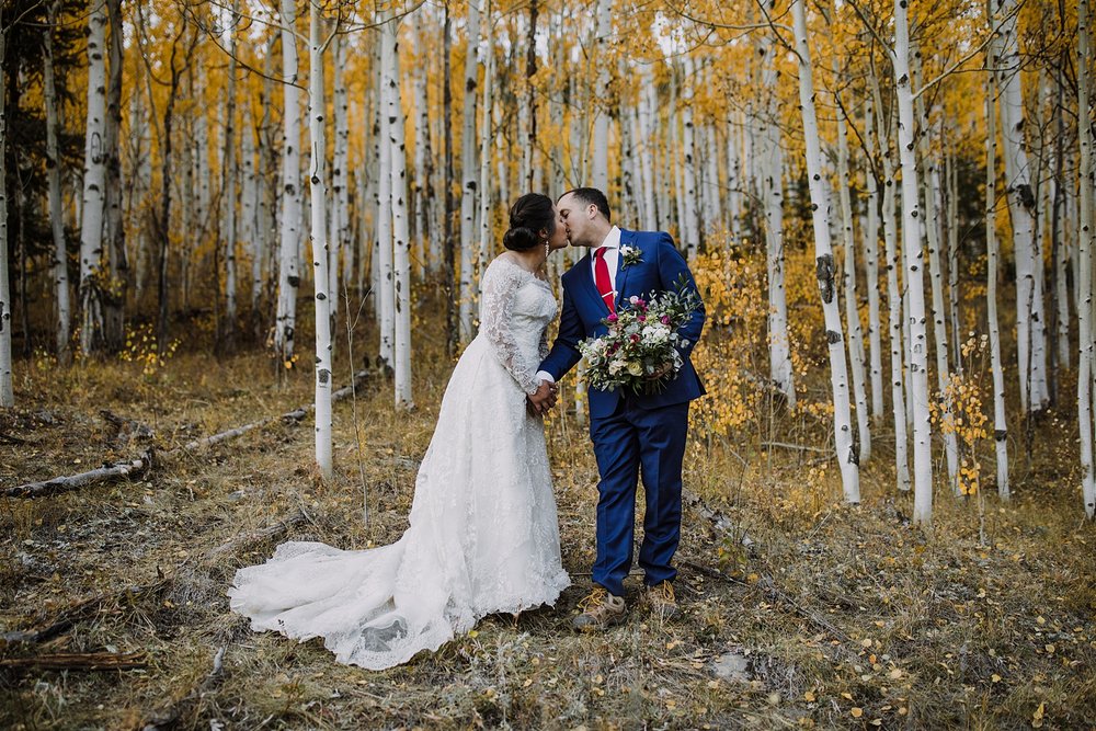 bride and groom celebrating their elopement, eloping in telluride colorado, camping elopement in southern colorado, hiking elopement in the san juan mountain range