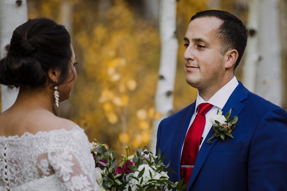 bride and groom share personal elopement vows, aspen grove elopement, fall mountain elopement, mountain wedding, autumn wedding, san juan hiking elopement