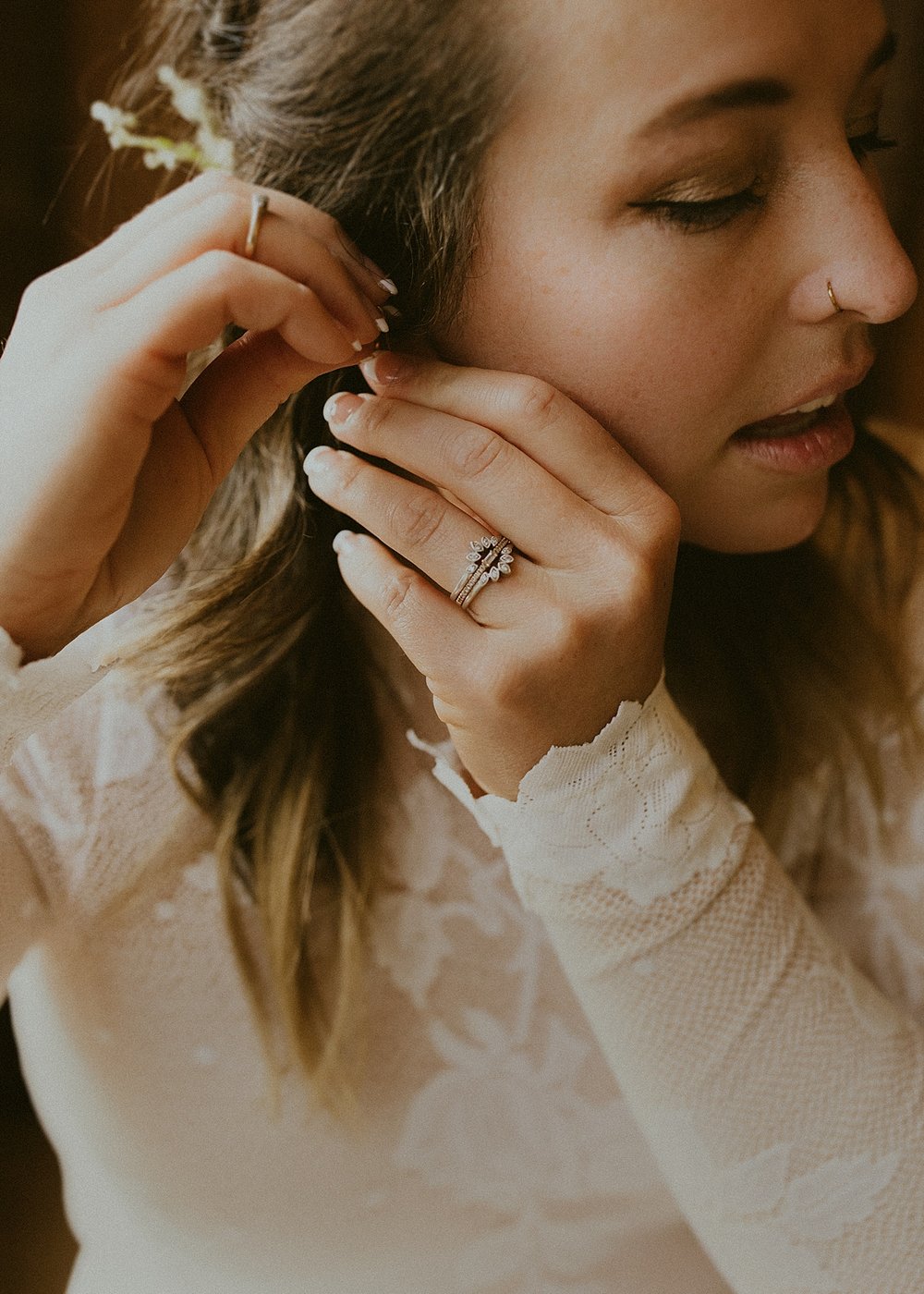 bride getting ready, bride putting on dress, getting ready at studio 508, city on a hill coffee shop elopement, leadville colorado elopement, lake county elopement, colorado mountain elopement