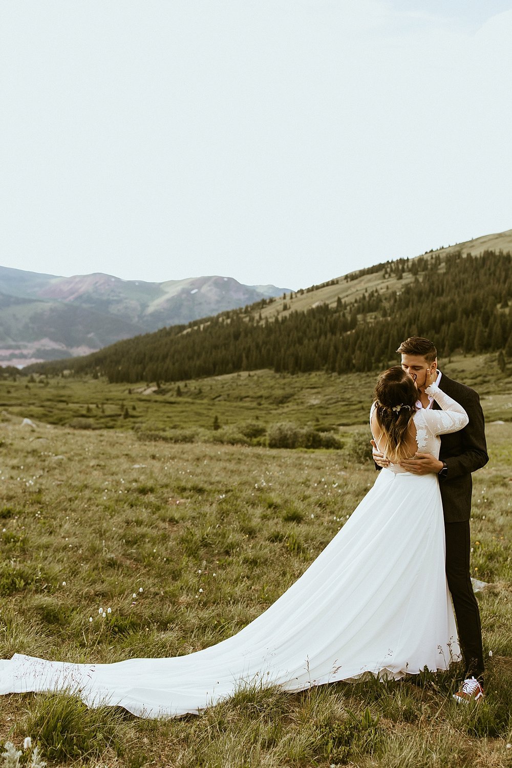 bride and groom kissing, colorado mountain hiking elopement, mayflower gulch elopement, colorado rockies elopement, rocky mountain elopement, leadville colorado elopement, summer mountain elopement