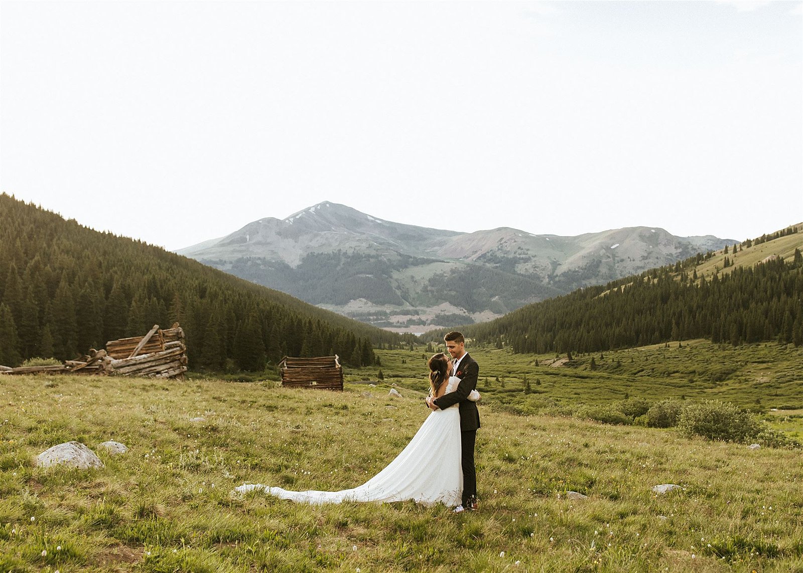 bride and groom hiking, colorado mountain hiking elopement, mayflower gulch elopement, colorado rockies elopement, rocky mountain elopement, leadville colorado elopement, summer mountain elopement