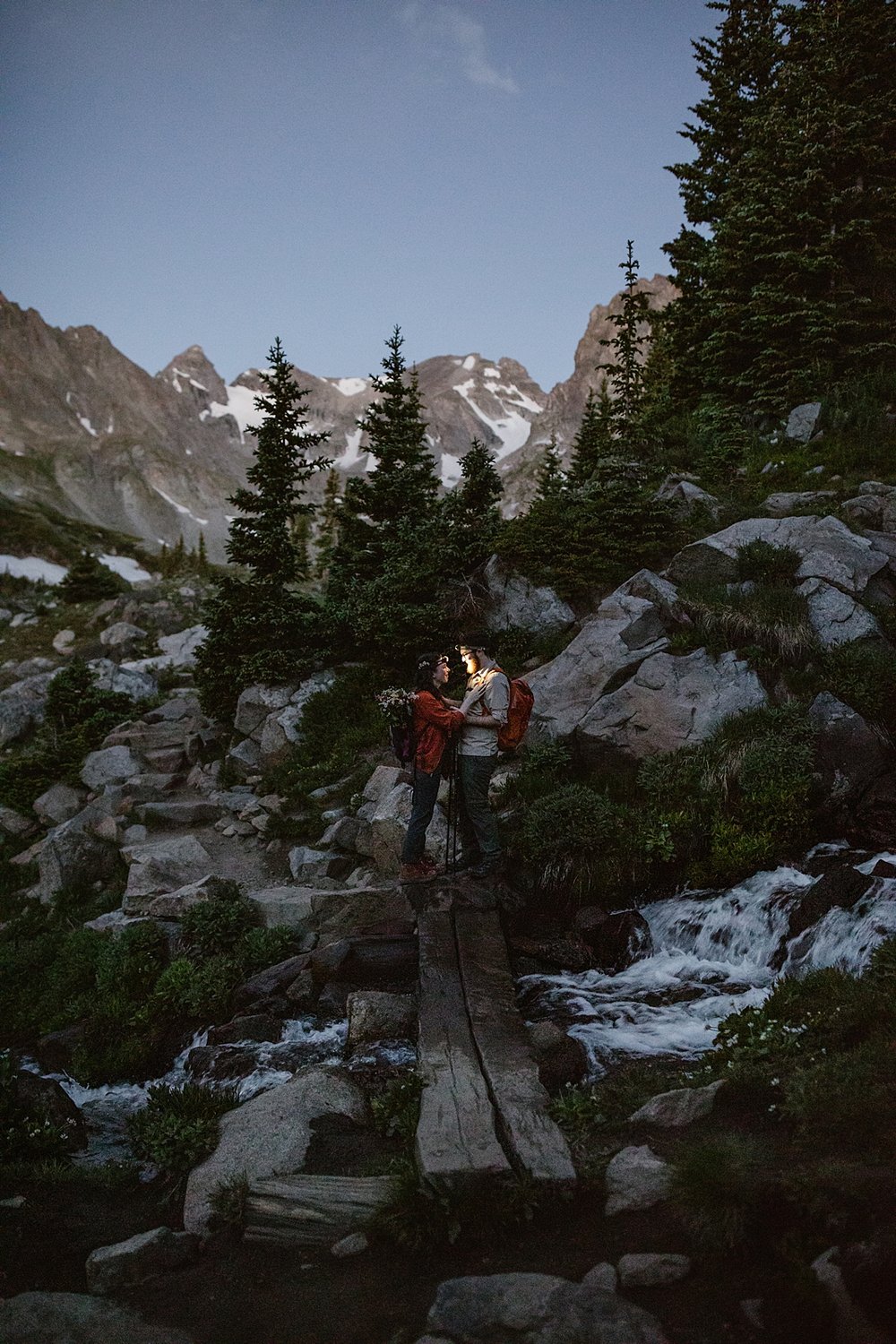 bride and groom hiking prior to sunrise, mountain hiking elopement, lake isabelle elopement, colorado rocky mountains elopement, sunrise elopement