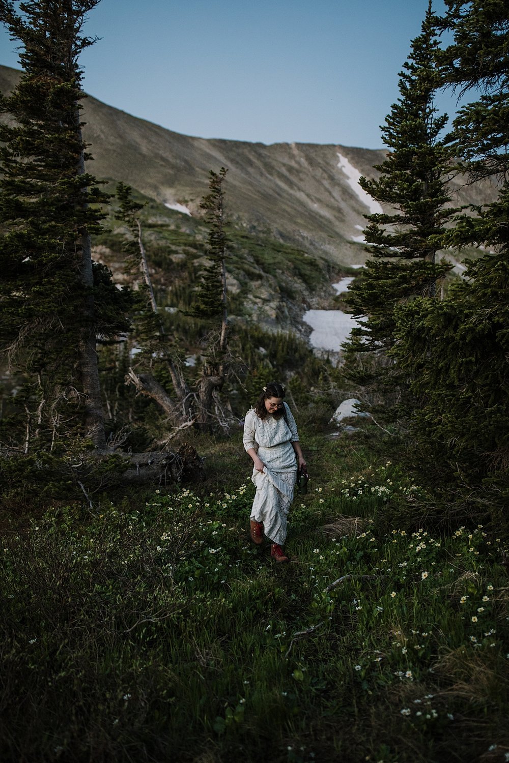 bride getting ready in the trees, shoshoni peak elopement, lake isabelle elopement, pawnee pass elopement, hiking long lake and lake isabelle, brainard lake elopement