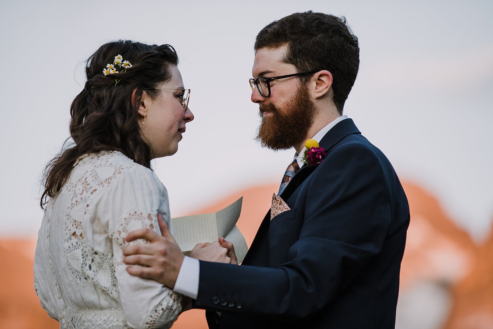 bride sharing handwritten vows, colorado mountain alpenglow, sunrise in the indian peaks wilderness, intimate elopement ceremony, rocky mountain sunrise