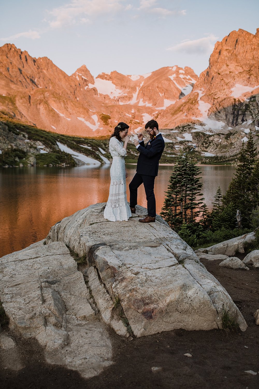 couple eloping in the mountains, self solemnizing in colorado, self solemnizing ceremony, hiking elopement ceremony, continental divide sunrise, pink mountains