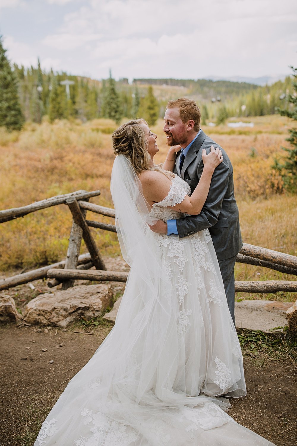 bride and groom hugging by cucumber gulch, breckenridge autumn leaves, aspen leaves changing, fall aspen wedding, colorado aspen leaves, colorado fall wedding, summit county fall colors