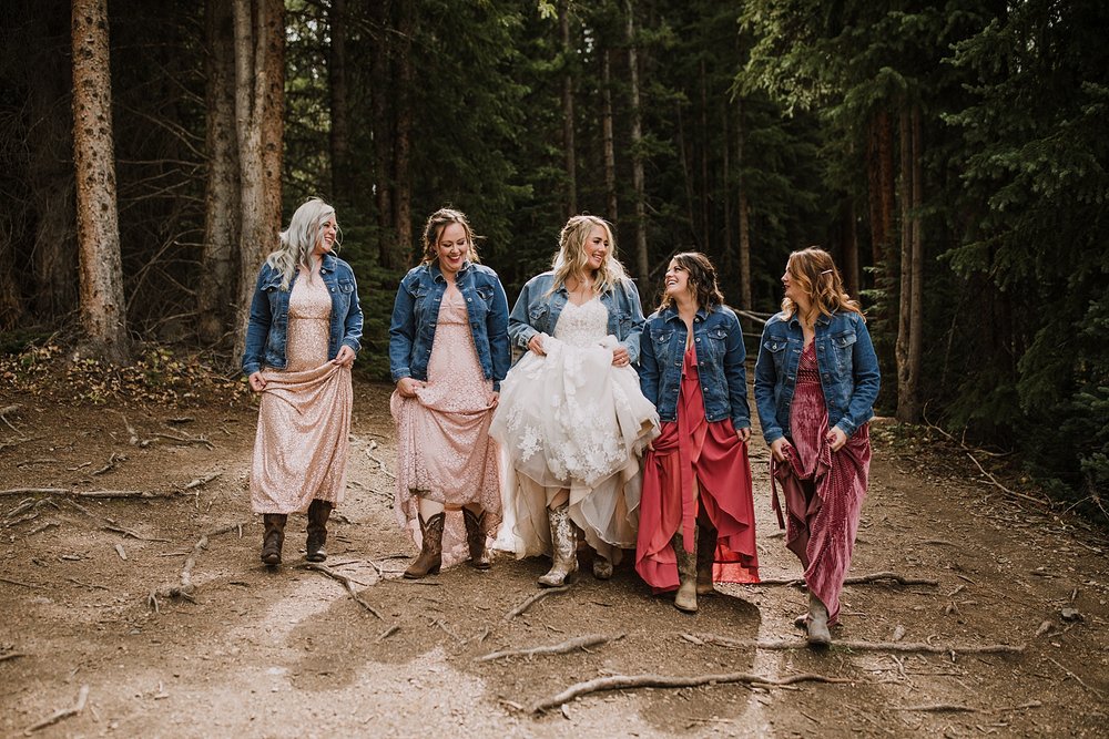 bridesmaids hiking together, breckenridge nordic center wedding, breckenridge ski mountain wedding, carter park pavilion wedding, summit county colorado wedding, fall wedding in breckenridge