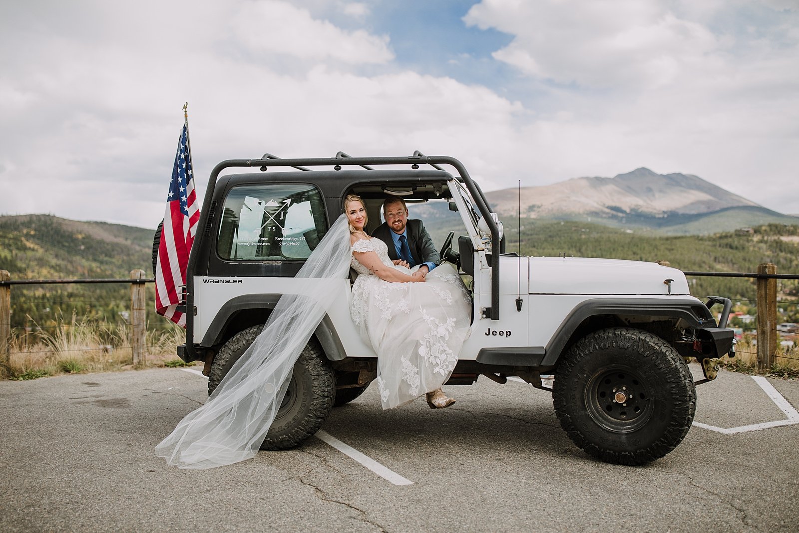 bride and groom riding in jeep, colorado jeep wedding, off roading wedding day, breckenridge jeep wedding, colorado conservative, breckenridge overlook wedding, st. johns pass jeep trail 