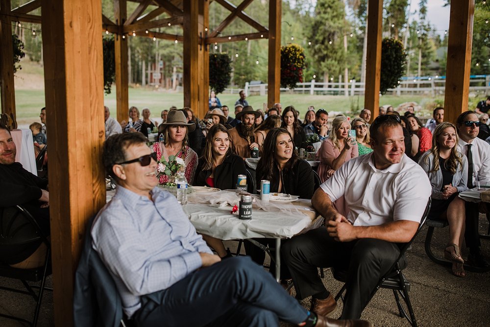 guests reacting to bridesmaids song, bridesmaid speech ideas, carter park outdoor reception, breckenridge colorado outdoor wedding, summer wedding on breckenridge mountain, summer mountain wedding