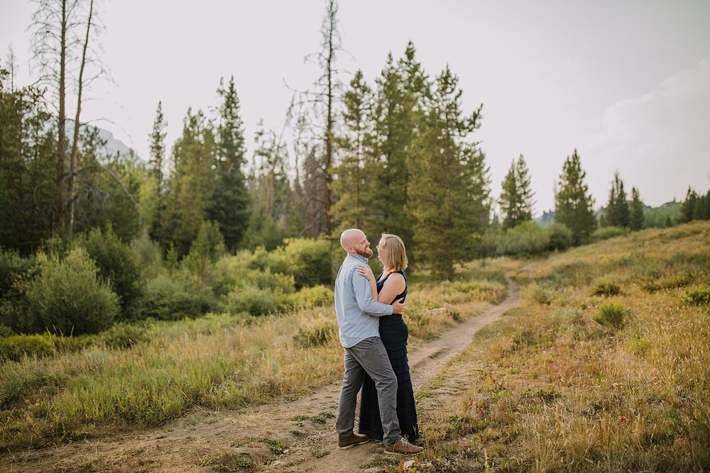 couple walking on a hiking trail, wildernest colorado elopement, silverthorne pavilion wedding, gore range elopement, gore range hiking, eagles nest wilderness wedding