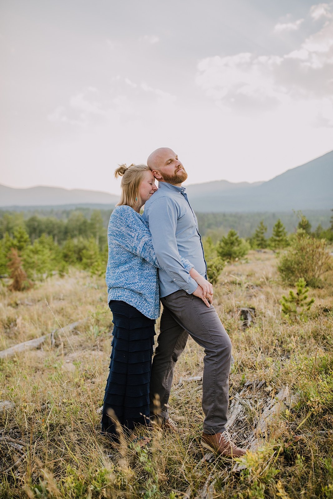 couple snuggling, continental divide elopement, colorado wildfire, summit county elopement photographer, silverthorne colorado elopement photographer, frisco colorado elopement photographer 