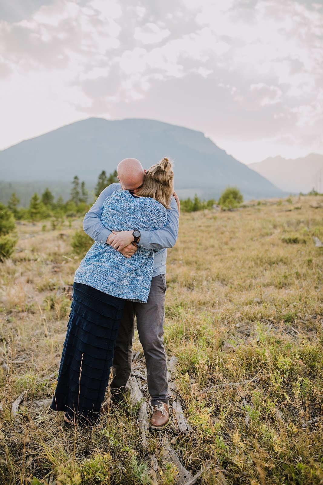 couple hugging, continental divide elopement, colorado wildfire, summit county elopement photographer, silverthorne colorado elopement photographer, frisco colorado elopement photographer 