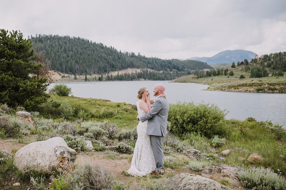 bride and groom talking after first look, bride wearing bhldn, dillon lake reservoir wedding, summit cove wedding, keystone colorado wedding, keystone colorado wedding photographer, colter bay wedding