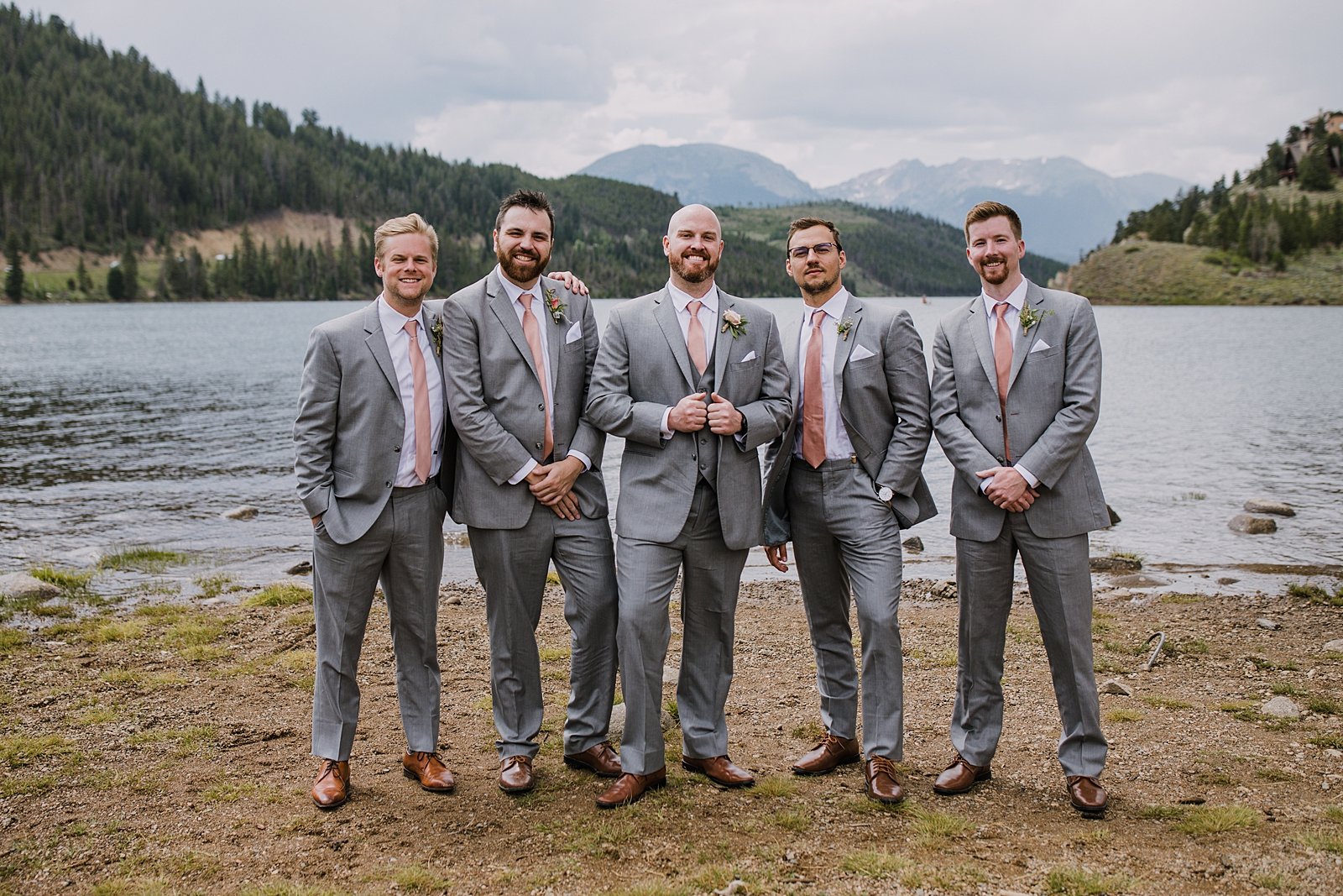 groom and groomsmen standing together on lake shore, lake shore group photo location, summit county wedding photographer, snake inlet wedding, snake inlet fishing, summit county wedding