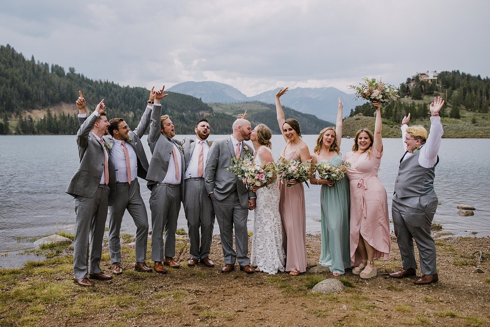 colorado bridal party cheering for bride and groom, lake shore group photo location, summit county wedding photographer, snake inlet wedding, snake inlet fishing, summit county colorado wedding