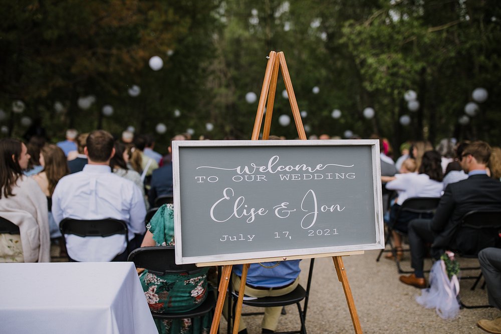 wedding welcome sign, wedding seating sign, mountain wedding details, silverthorne pavilion ceremony site, rocky mountain wedding photographer, rocky mountain wedding, blue river wedding