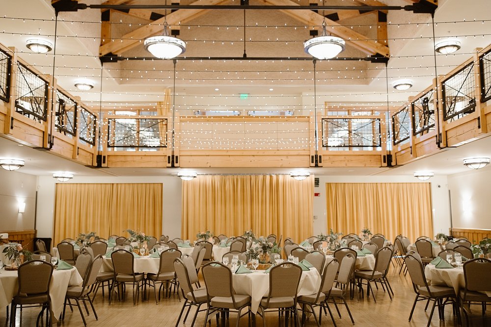 reception tables, pink and green sage wedding details, silverthorne pavilion reception space, silverthorne pavilion wedding reception, mountain wedding decor, silverthorne colorado wedding reception