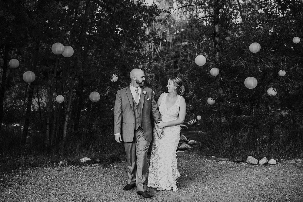 bride and groom holding hands, colter bay wedding, wyoming mountain wedding, grand teton national park wedding, colter bay wedding photographer, jackson hole wedding