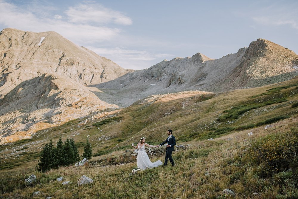 couple drinking beers to celebrate post elopement, bald mountain elopement, gold hill elopement, mt quandary elopement, post wedding beers, hiking beers, bridal floral crown, dog friendly elopement