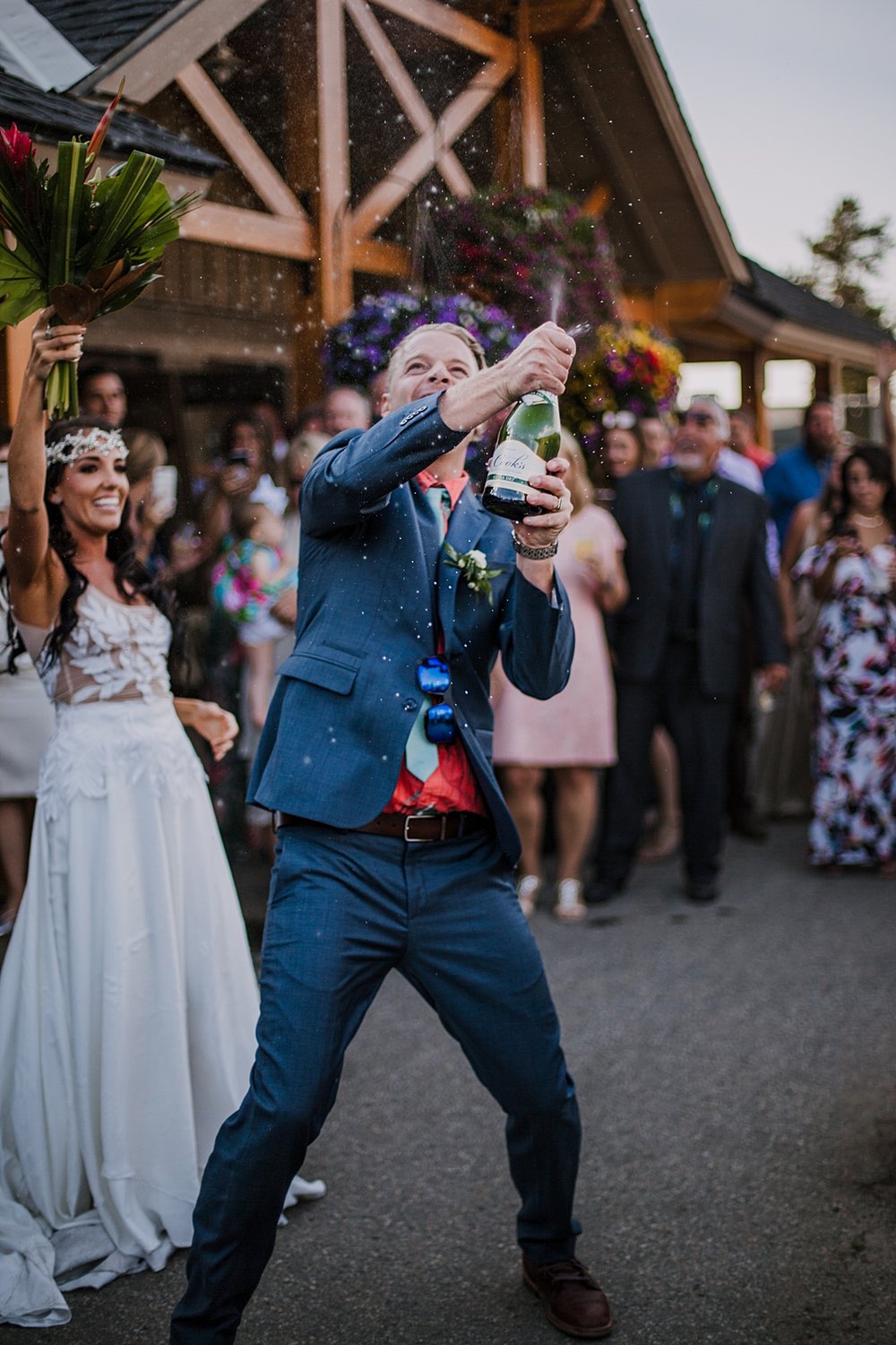 groom popping champagne, desiree hartsock wedding dress, bridal headband, carter park pavilion wedding, carter park wedding reception, carter park pavilion wedding venue, wedding champagne pop