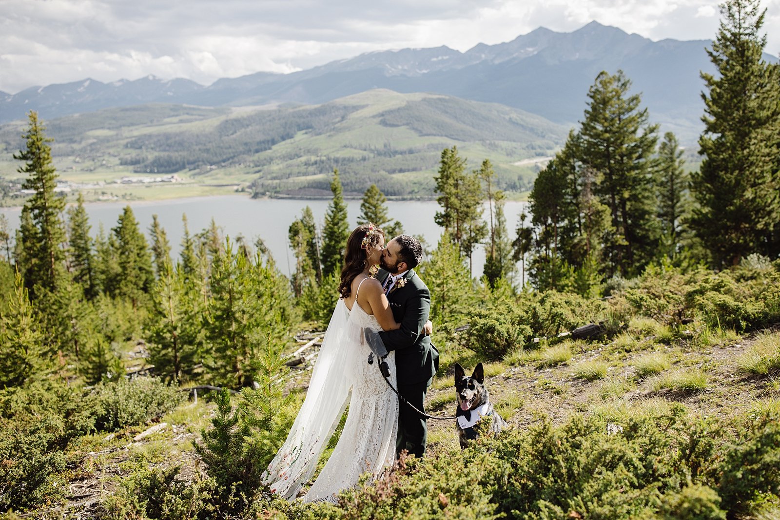 bride and groom hiking with their dog, sapphire point elopement, dog friendly elopement in breckenridge, breckenridge colorado elopement, sapphire point wedding, sapphire point wedding