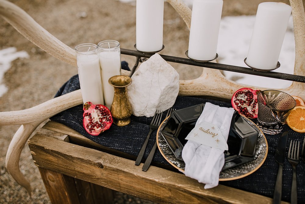 celestial styled wedding table, pomegranate wedding decor, starry wedding inspiration, fall color wedding palette, moody autumn wedding, halloween wedding, antler wedding decor, til death wedding