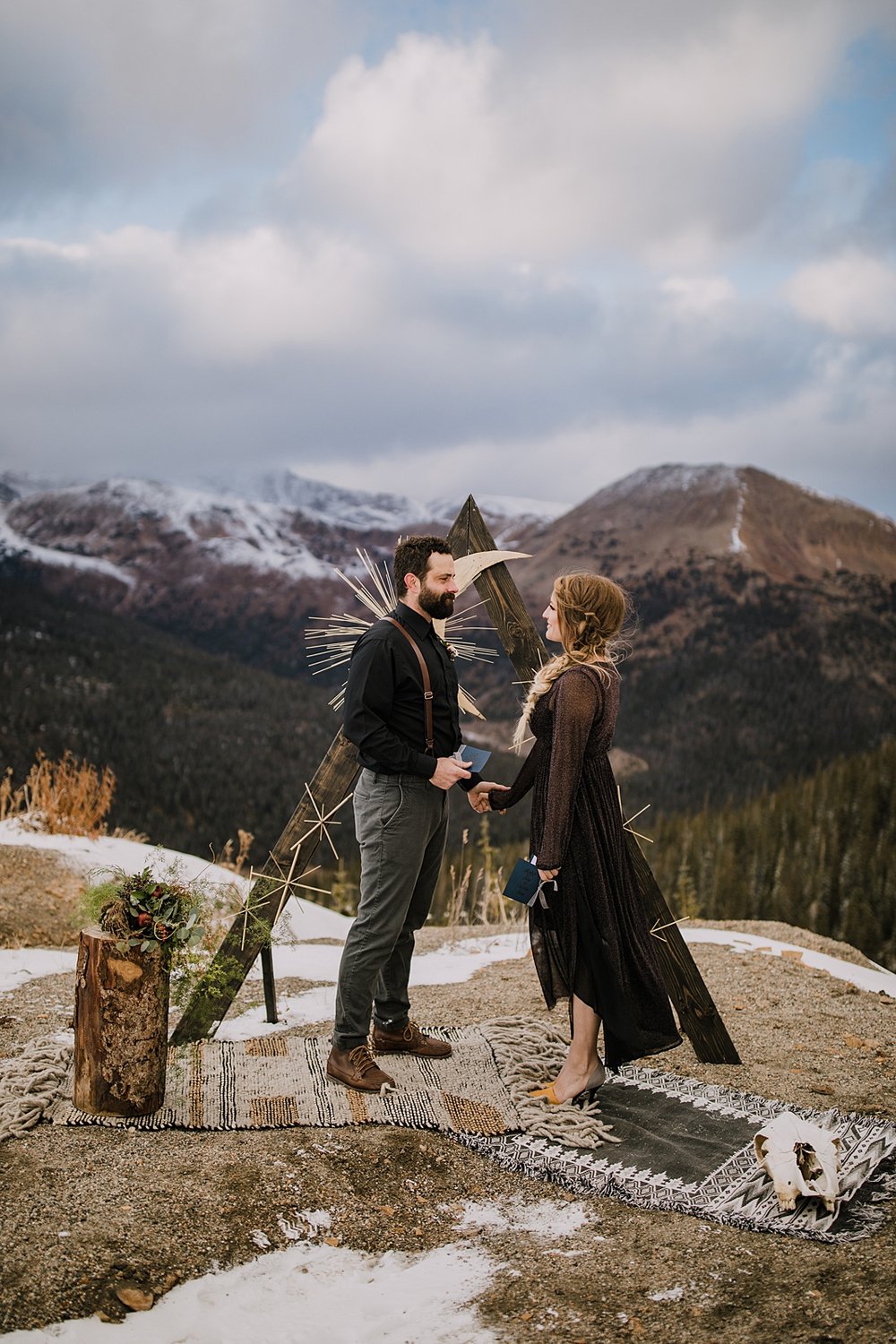 bride sharing her vows with the groom, starry night themed wedding, colorful wedding dress, dark wedding colors, dark wedding palette, dark toned wedding, dark toned elopement, wedding vow books