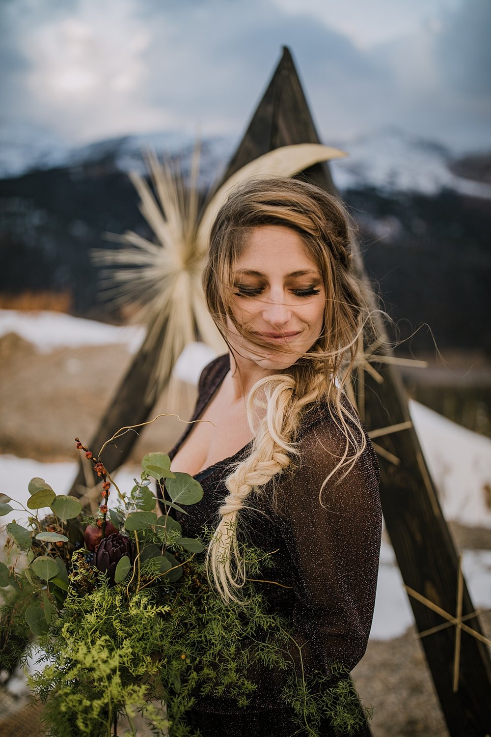 brides hair sweeping across her face, rock and roll grunge elopement, rock and roll themed elopement, fall mountain elopement, galactic wedding dress, ethereal wedding dress, magical autumn elopement