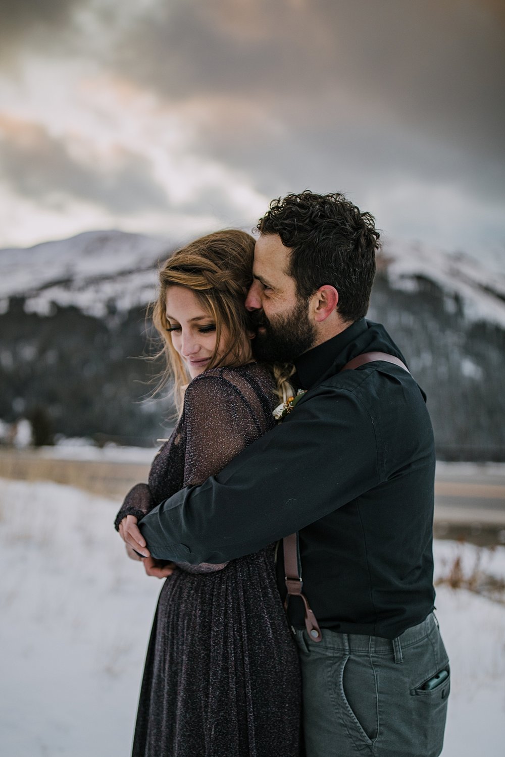 bride wearing shimmery black wedding dress, arapaho basin elopement, arapaho basin wedding, loveland pass wedding, loveland pass elopement, dark wedding attire, sparkly black wedding dress