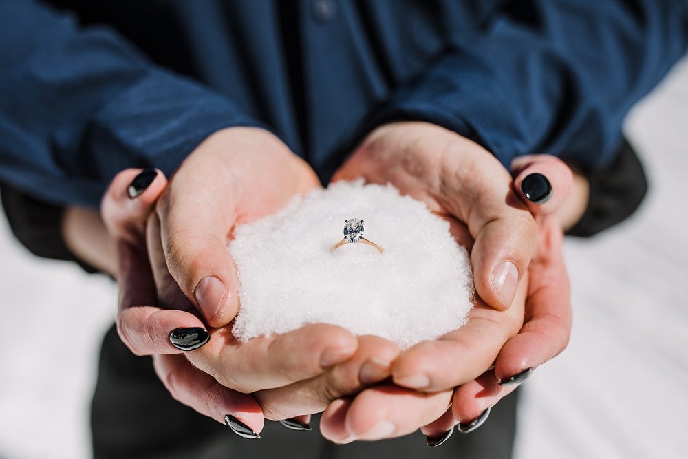 engagement ring in the snow, black nails for engagement, black nails for proposal, poses for showing off engagement ring, couple holding hands, breckenridge colorado engagement photographer