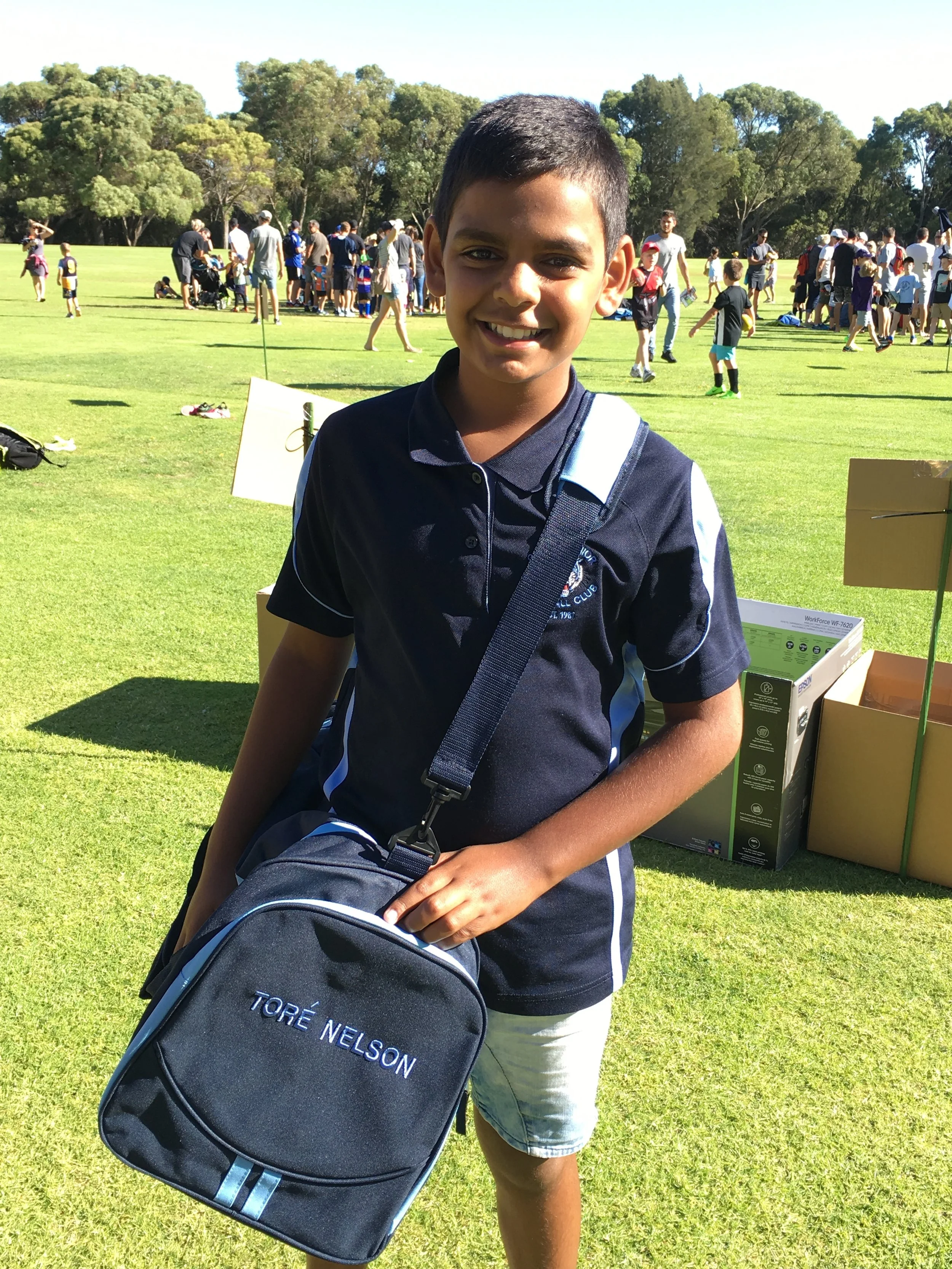Tore Nelson, Year 5 Cougars, very happy with his new Club sports bag