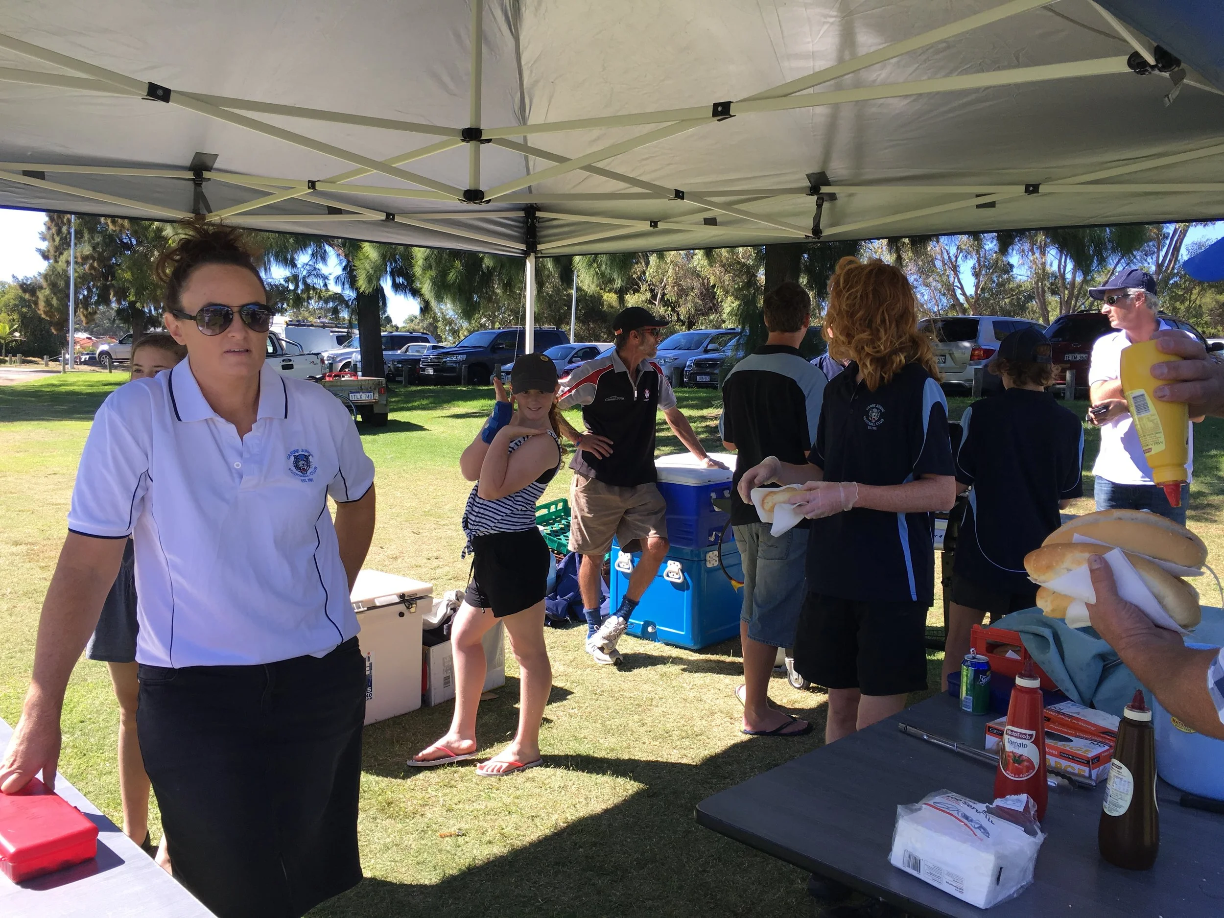 Managers Coordinator Jennifer Jury supervising the Year 10s on BBQ duty