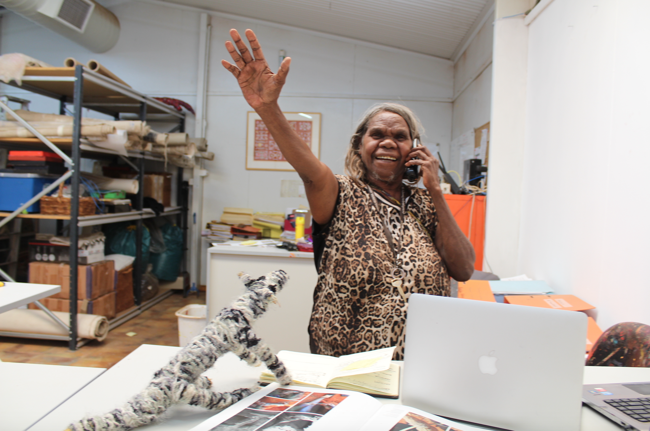 Mrs Norris takes a call at Katjiti Arts Fregon