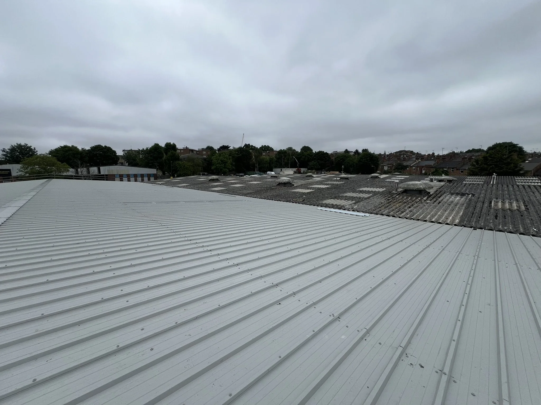 May 2025, Going Green, 1st step replace Asbestos Roof with new Insualated Roof, TSL HQ, London