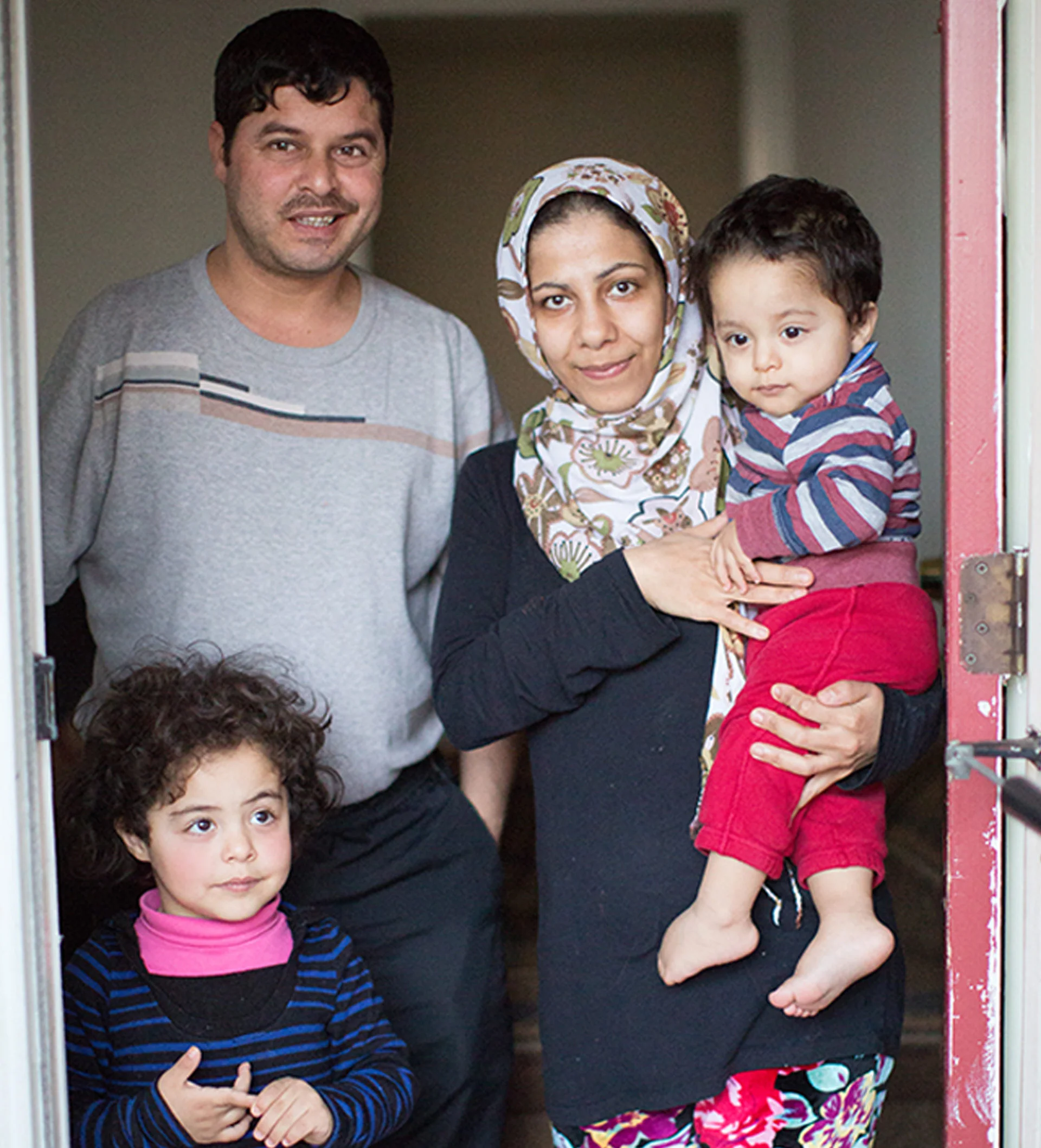 Family-in-a-doorway-e1497555069530.jpg