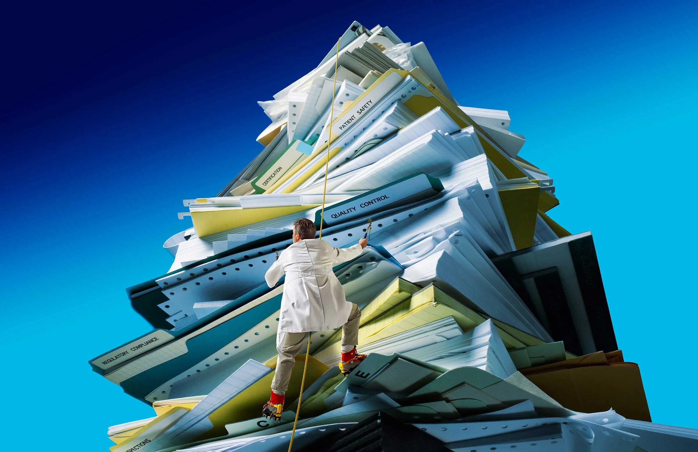 tiny-man-climbing-mountain-of-paper.jpg